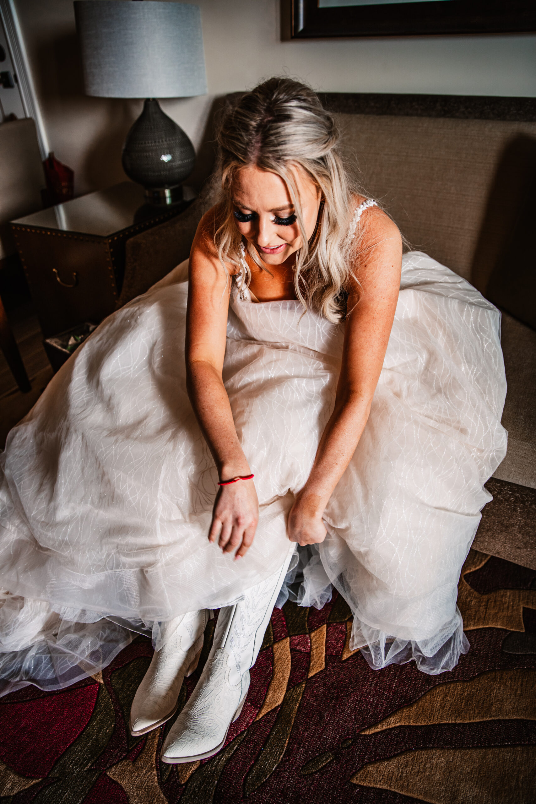 bride putting on her shoes