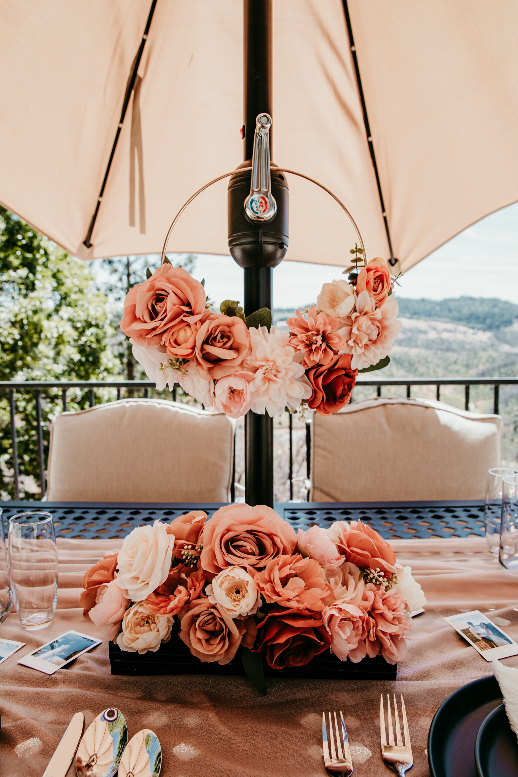 Floral hoop and tablescape setup for an intimate brunch reception at a Northern California elopement overlooking the mountains.