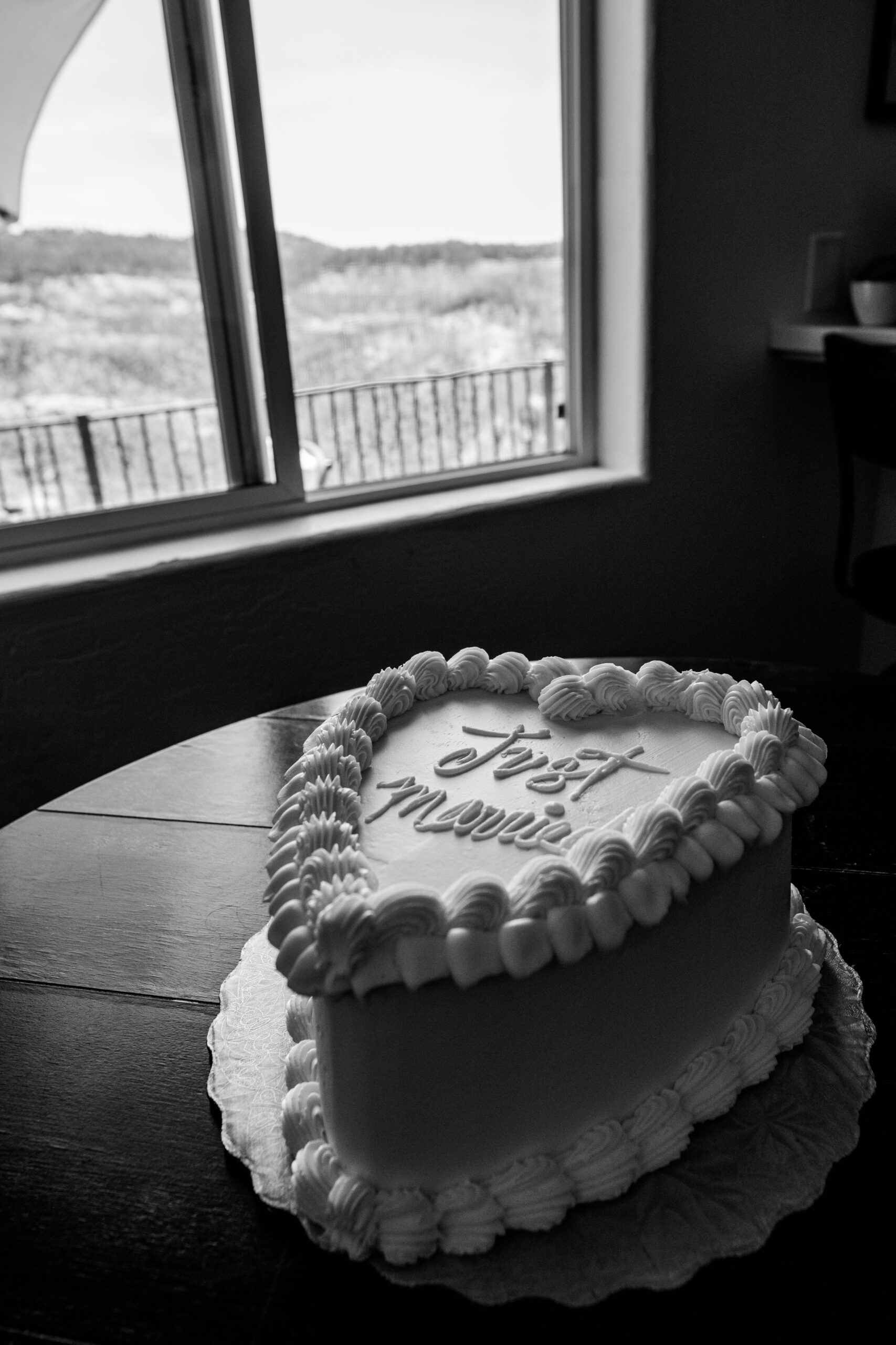 Heart-shaped “Just Married” cake at an intimate Northern California elopement, photographed in black and white.