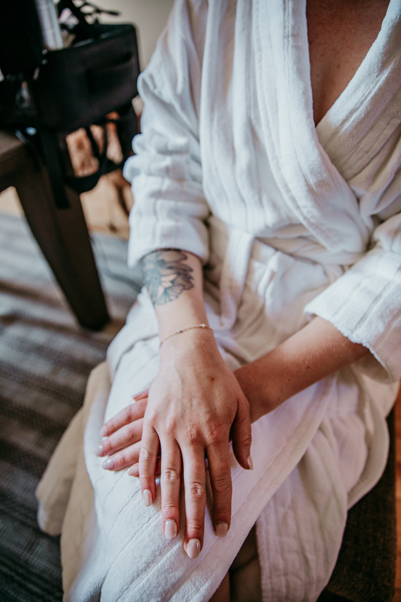 Close-up of the bride’s hands and engagement ring before her Logan Shoals Vista Point elopement.