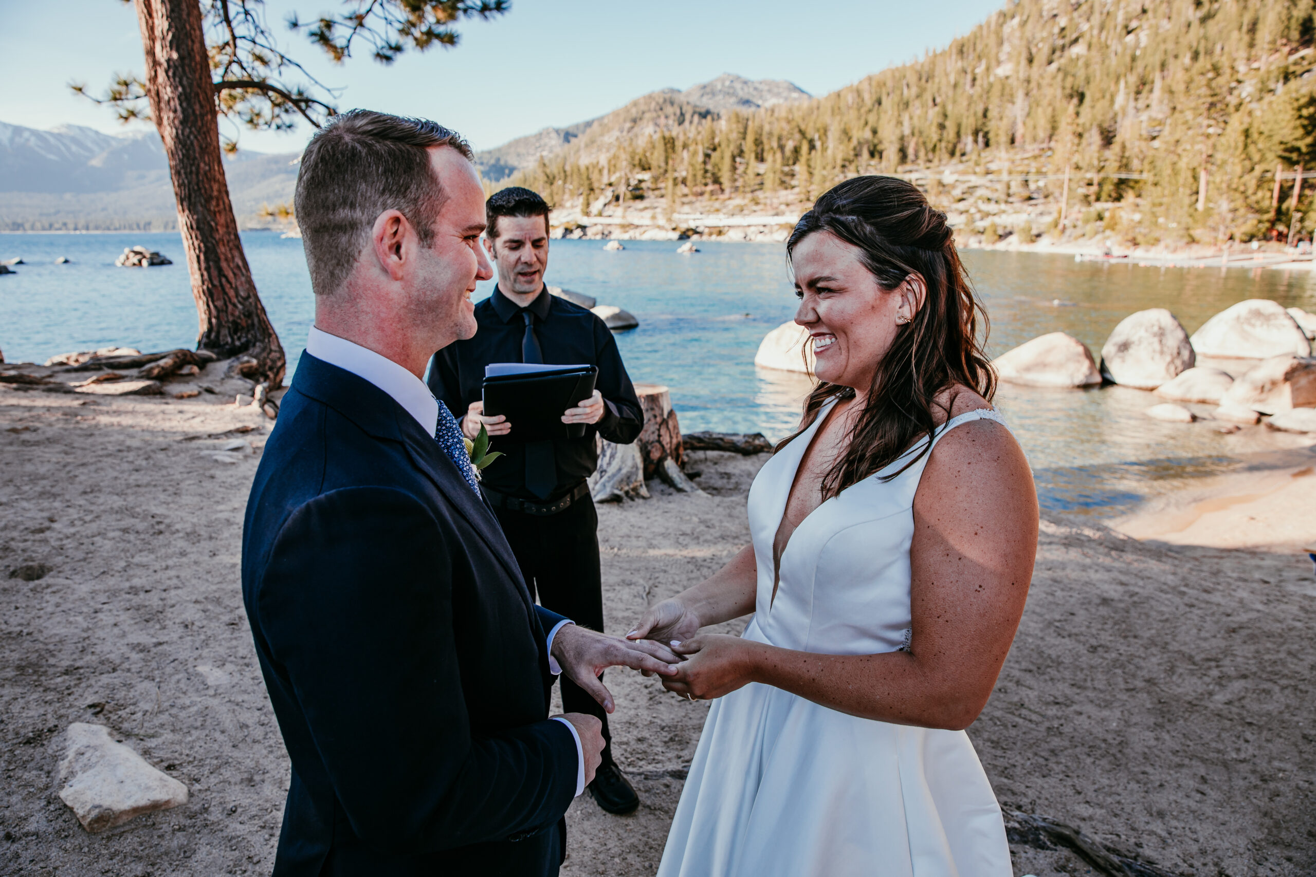 Bride and groom exchanging rings during a simple elopement ceremony—how to get married at Sand Harbor with a stress-free, intimate celebration