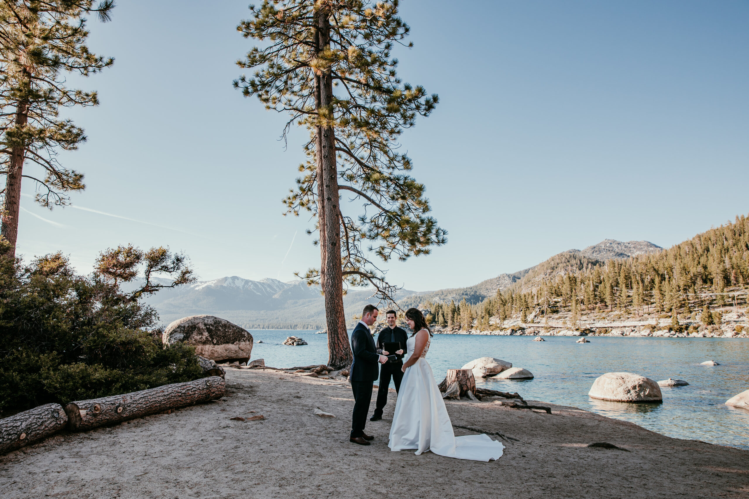 Elopement ceremony at Sand Harbor with views of Lake Tahoe and surrounding mountains—how to get married at Sand Harbor in a scenic, natural setting.