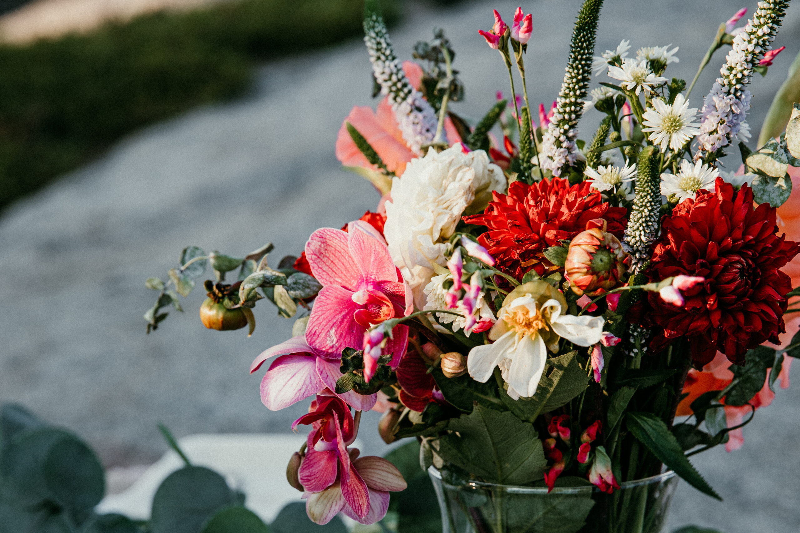 Colorful wedding bouquet with pink and red flowers at Elise and Dan’s elopement in Lake Tahoe.