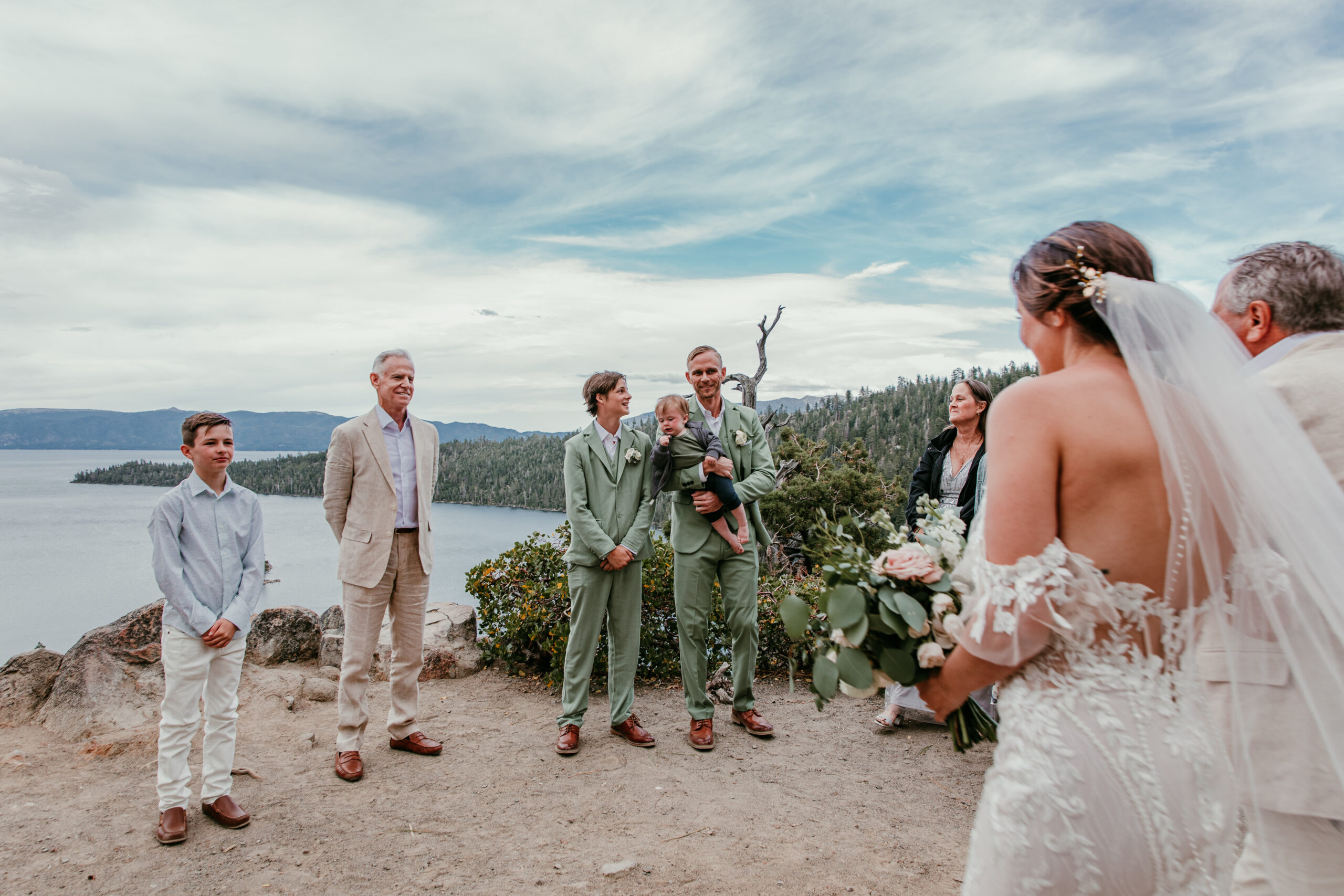 Small wedding ceremony with close family overlooking Lake Tahoe, intimate and scenic setup