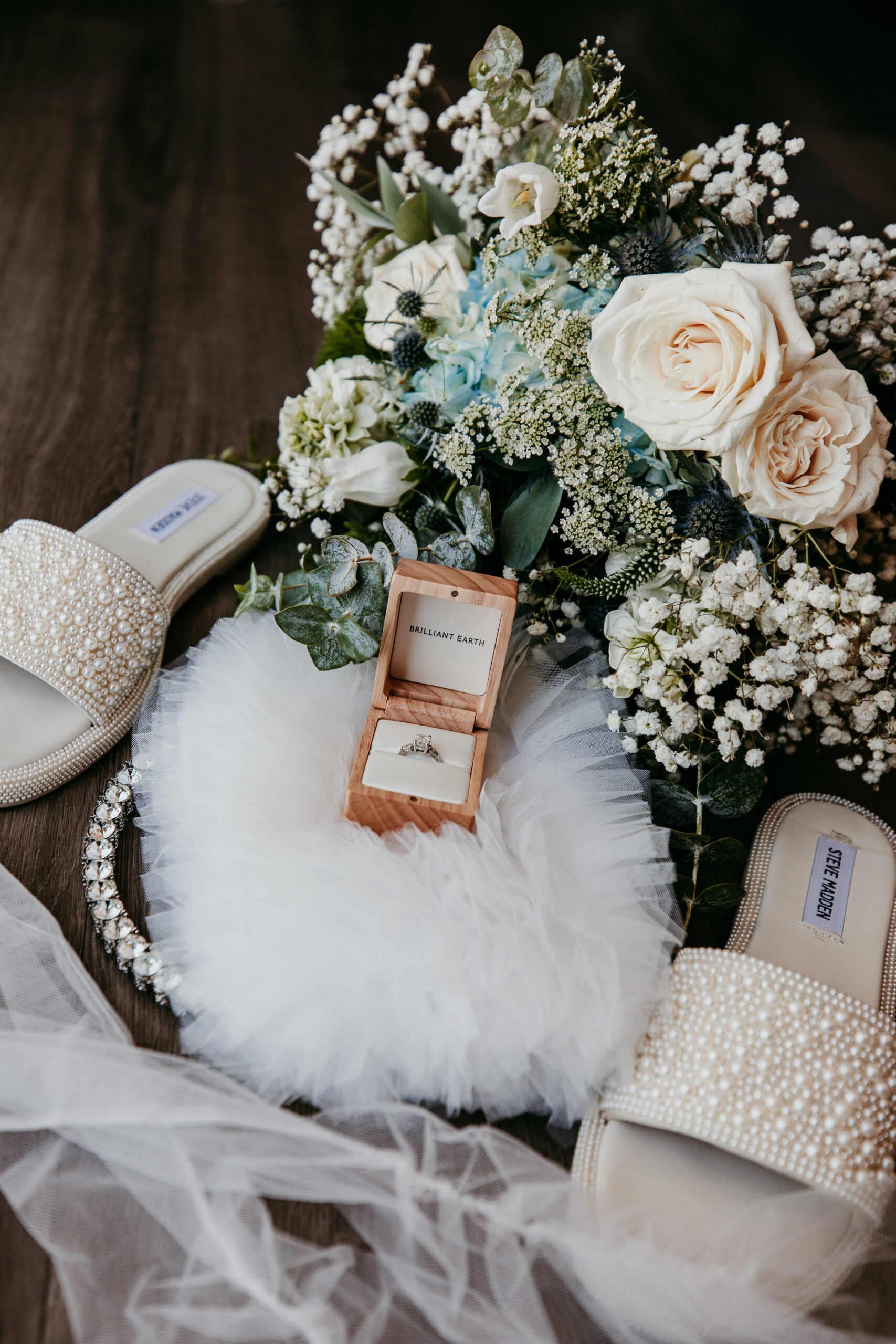Bridal details with bouquet, engagement ring, and shoes for Greg and Diana’s elopement Lake Tahoe.