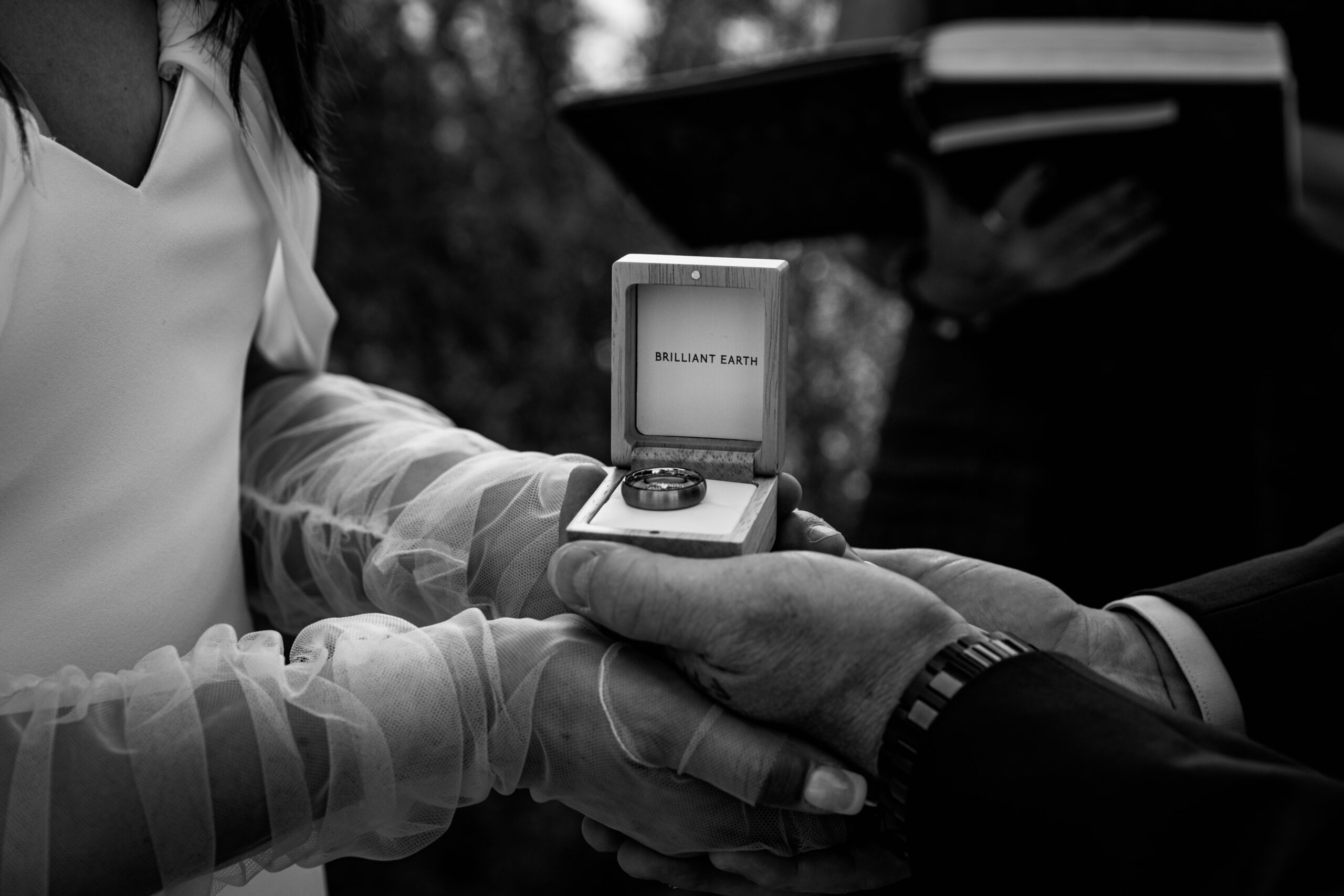 Wedding rings in a Brilliant Earth box being exchanged during an intimate elopement Lake Tahoe ceremony.