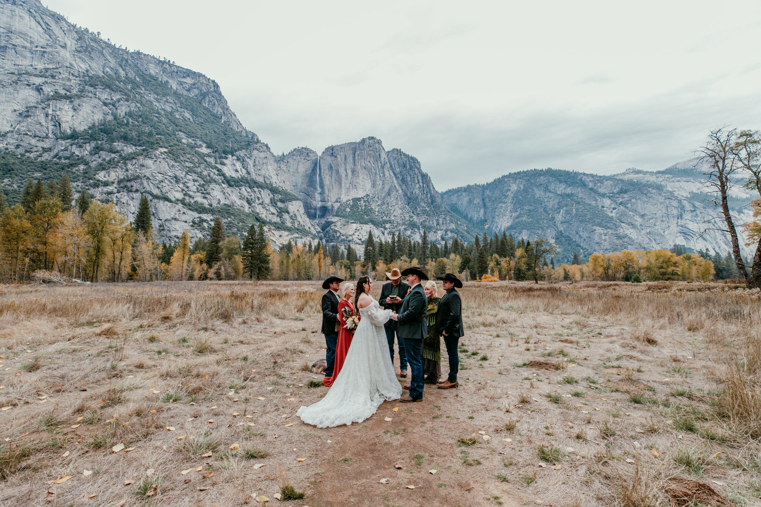 Intimate Yosemite elopement ceremony with a small group of family and friends in a mountain meadow