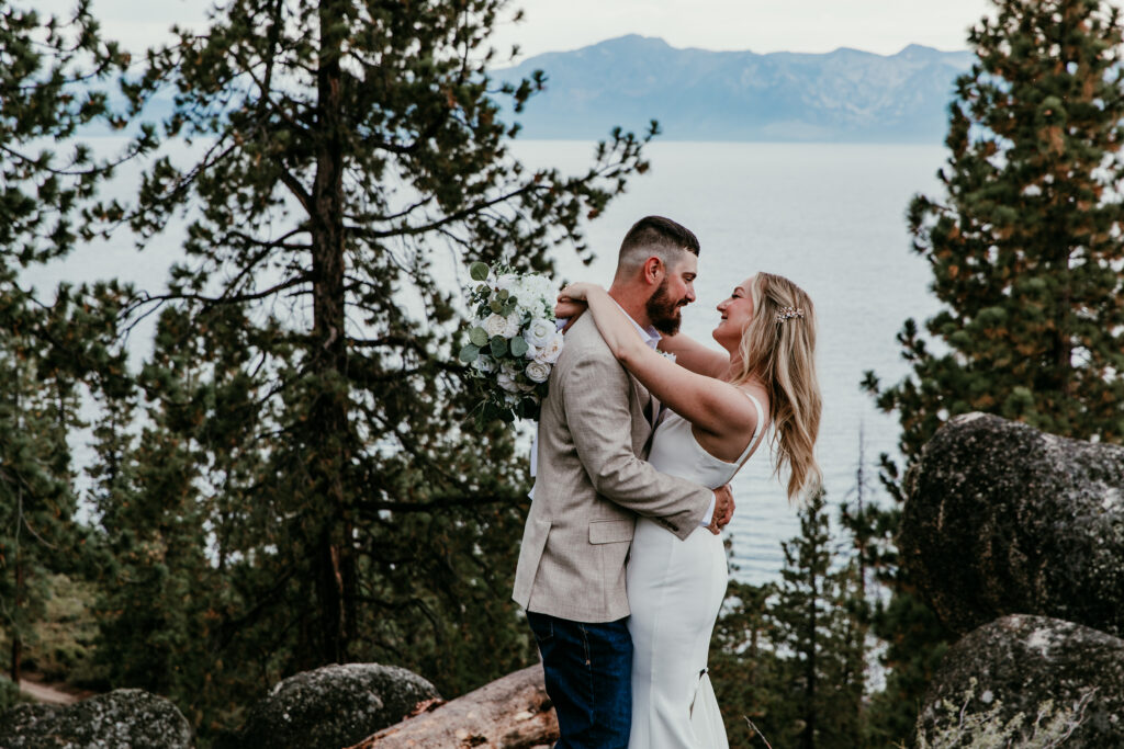 Romantic portrait during Lake Tahoe elopement at Logan Shoals with forest and lake view