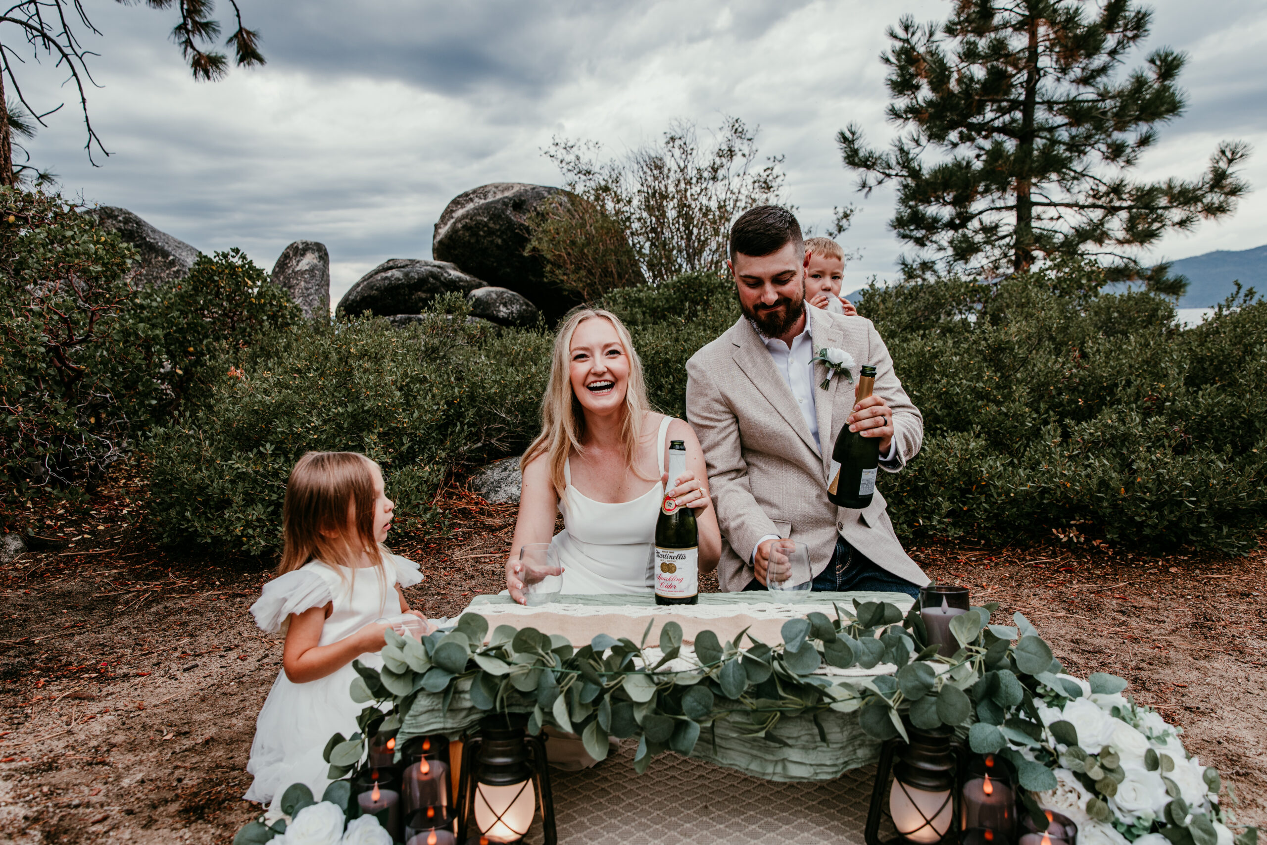 Apple cider toast celebration during Lake Tahoe blended family elopement at Sand Harbor