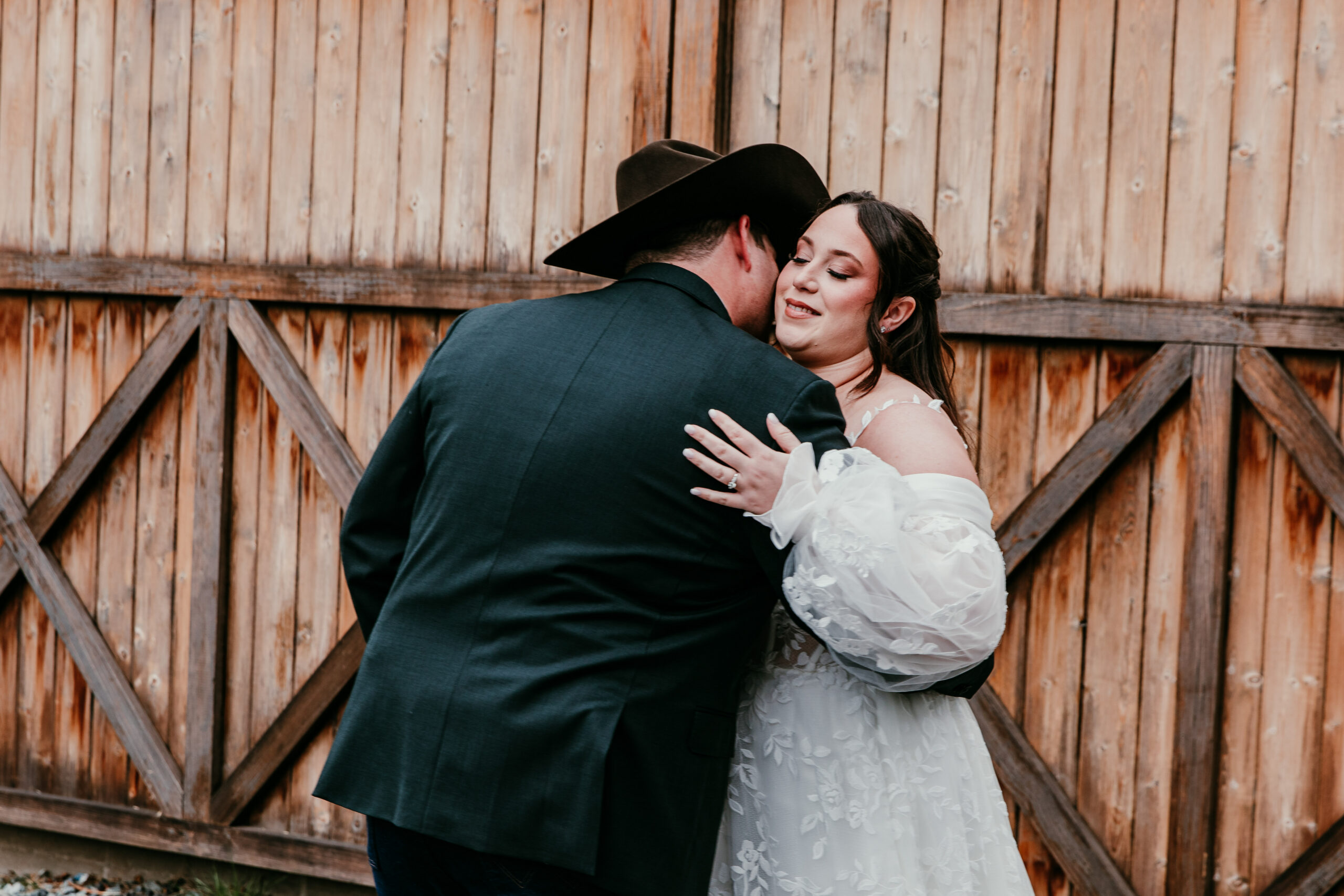 couple hugging during their first look before a fall elopement in Yosemite