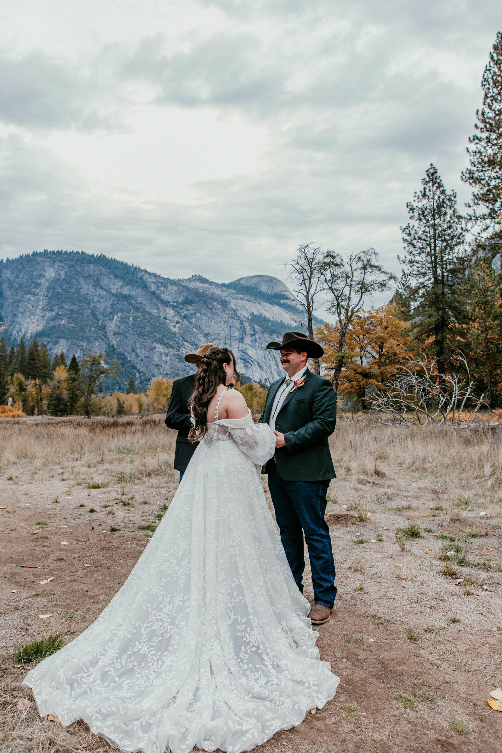 Bride and groom celebrating their ceremony surrounded by Yosemite’s granite cliffs, a beautiful elopement idea in California