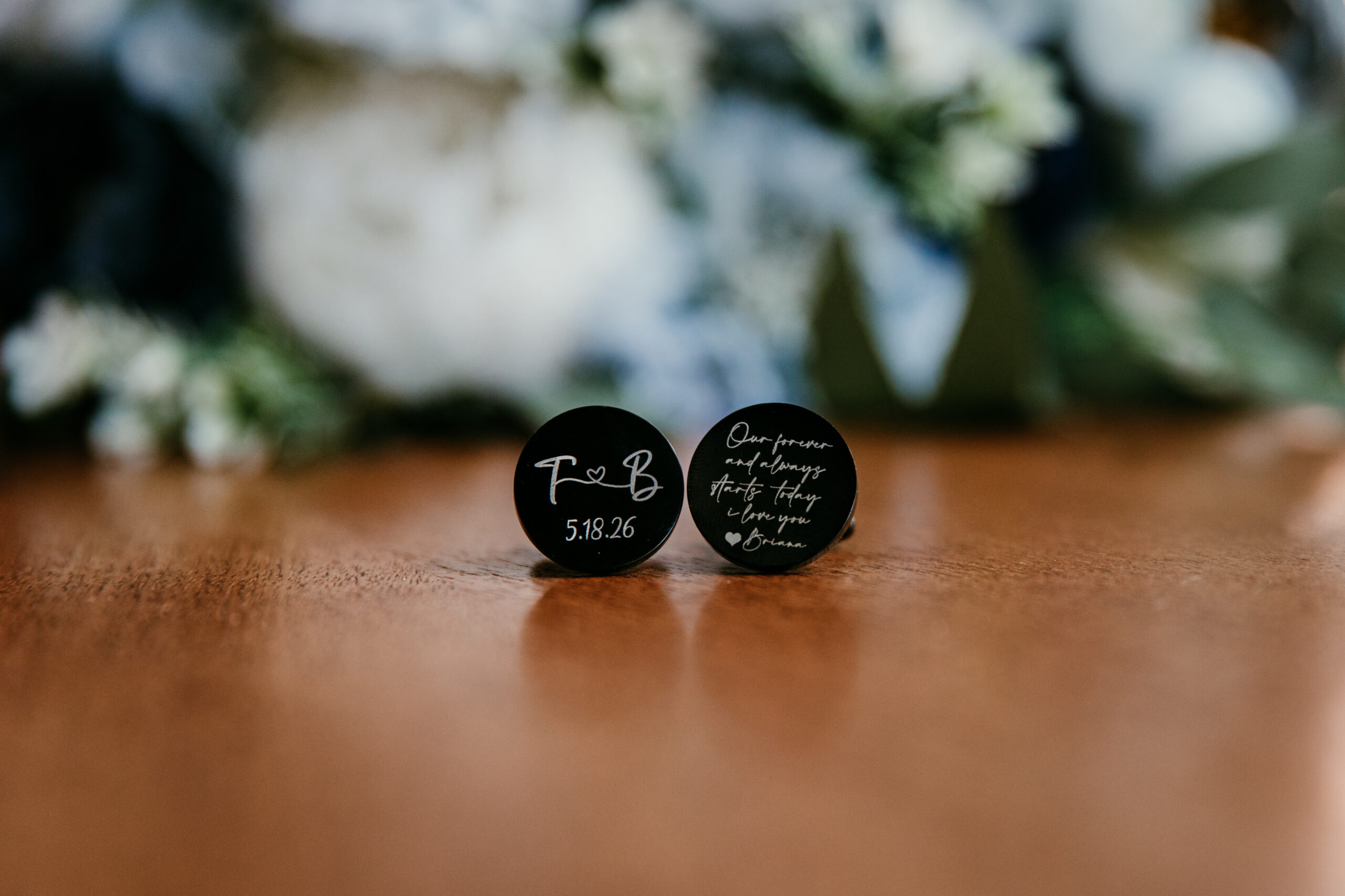 Custom black cufflinks with the couple’s initials and wedding date before their Sand Harbor elopement.