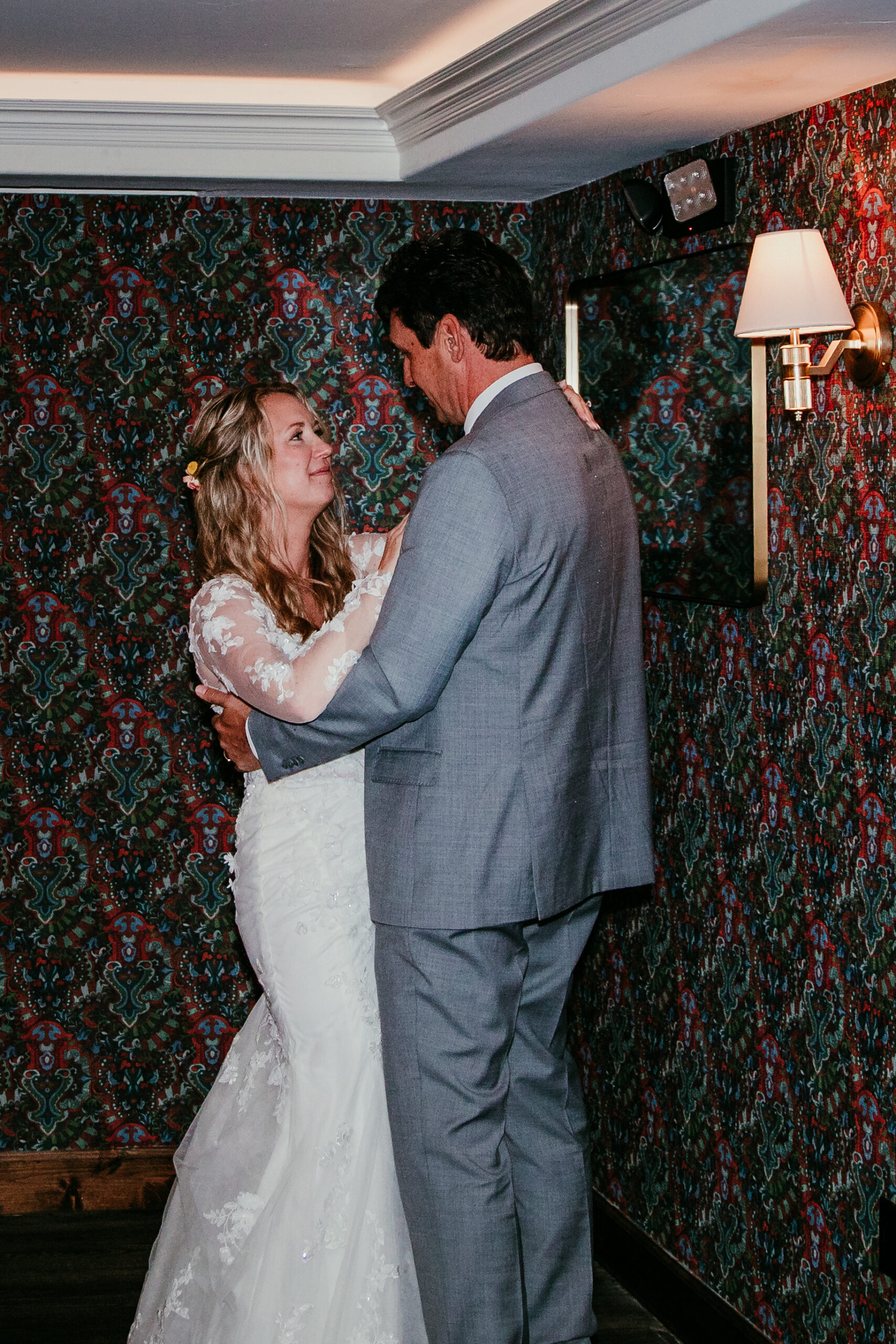 Bride and groom sharing an intimate first dance at The Landing Resort after their rainy Lake Tahoe elopement.